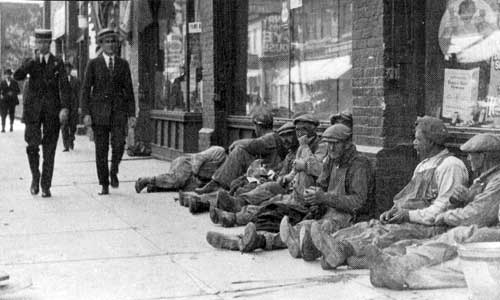 Figure 2: Unidentified workmen having lunch on Main&nbsp;Street, 1922.