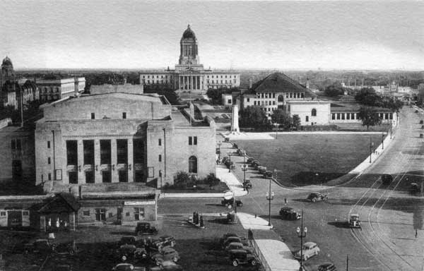 View from the back of the Hudson&rsquo;s Bay store, circa 1948, showing the Winnipeg Auditorium (now home to the Archives of Manitoba and Manitoba Legislative Library) but also providing an unusual view of the Broadway Site including the &ldquo;Arts Building&rdquo; (the white building at the rear of the Science Building).