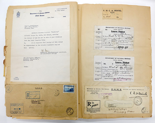 One of Fred McGuinness&rsquo;s scrapbooks contains documents relating to his 1941 discharge from the Royal Canadian Navy.