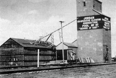 Manitoba Pool Elevator at Jordan, 1950. It was built by the Manitoba Elevator Commission in 1910 for $9,953.00 and sold in 1926 to United Grain Growers for $4,000 and in 1928 to the Manitoba Pool.