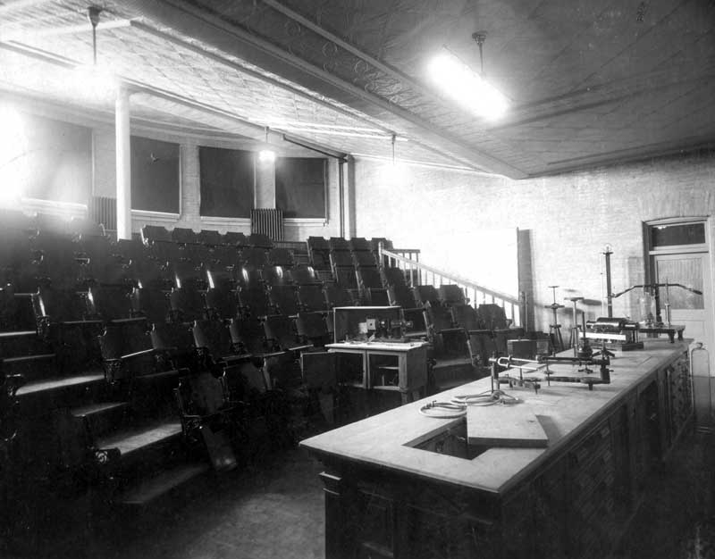 Science lecture theatre in the original University building, circa 1905, with magic lantern and apparatus.