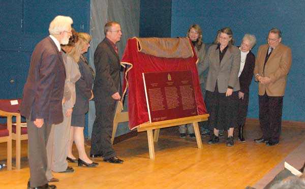 A plaque commemorating William Hespeler was unveiled at the University of Winnipeg. Witnessing it were (L-R): Dr. Robert O’Kell, Manitoba Representative, Historic Sites and Monuments Board of Canada (behind); Dr. Claudia Wright, Acting Vice-President (Research & Graduate Studies), University of Winnipeg; Dr. Angelika Sauer, Associate Professor of History, Texas Lutheran University; Ms Dawn Bronson, Superintendent, Manitoba Field Unit, Parks Canada Agency; Mr. Helmut Hesse, President, German-Canadian Congress (MB) Inc.; Ms Cindy Tugwell, Executive Director, Heritage Winnipeg; Ms Mary DeGrow, great-great-granddaughter of William Hespeler; Ms Penny McMillan, President, Heritage Winnipeg; Ms Bonnie Korzeniowski, MLA, Province of Manitoba; Mr. Grant Nordman, Councillor, City of Winnipeg