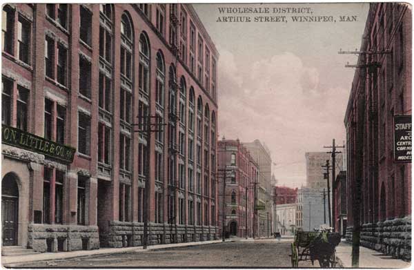 The Robinson, Little and Company Building, as well as the Whitla Building beside it, can be seen at left in this view of Arthur Street