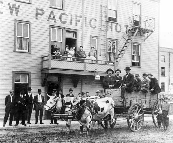 Carts pulled by oxen were already historic by the time of this 1904 photo, taken as a publicity stunt for the newly renovated and renamed Pacific Hotel.