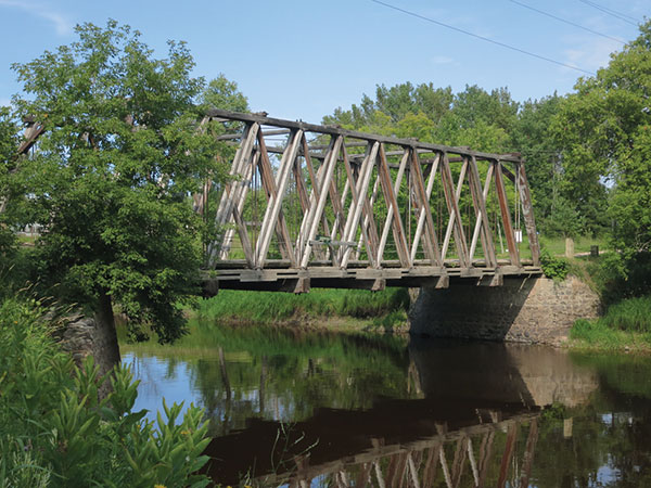 A wooden truss bridge over the Roseau River at Gardenton was built in 1918. A municipal historic site, it remains in active use.