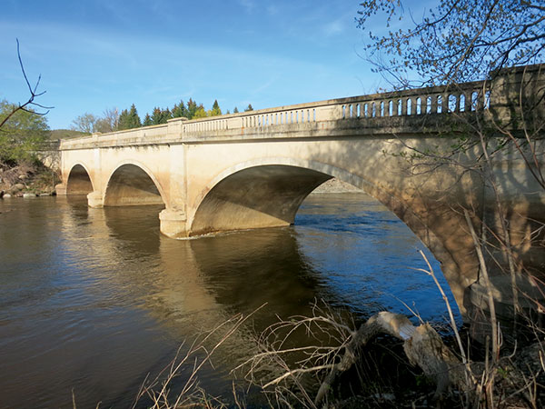 A graceful concrete bridge in the RM of Whitewater, built in 1929, enabled Highway No. 10 to cross the Souris River.