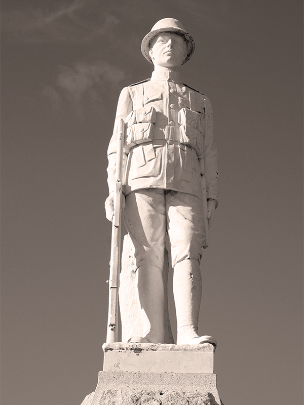 A marble soldier atop the war memorial at Newdale, Manitoba.