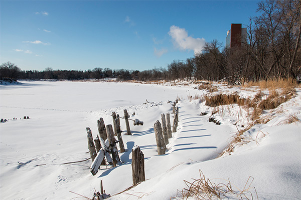 Figure 1. Remains of university dock, January 2018. The Pembina Hall residence can be seen in the background on the right.