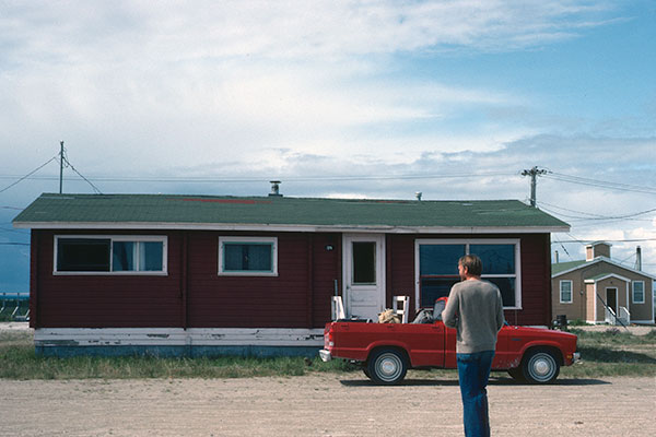 Residence of the former Akudlik community with a former church building in the right background