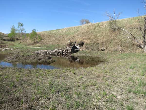 Steel culvert bridge over the Arrow River