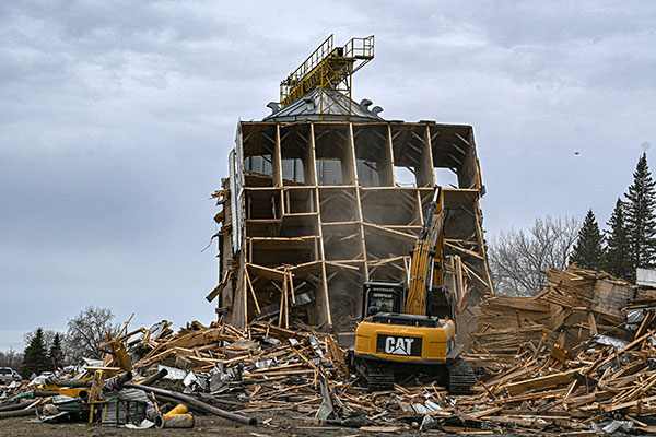 The former Manitoba Pool Grain Elevator at Austin under demolition