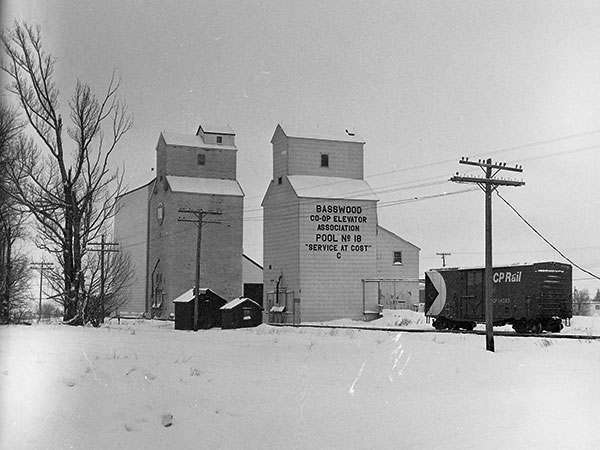 The former Manitoba Pool grain elevators A at left and C at centre at Basswood