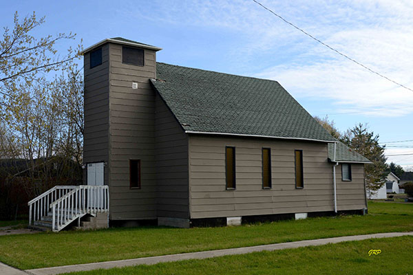 The former Robson School and Benito Anglican building