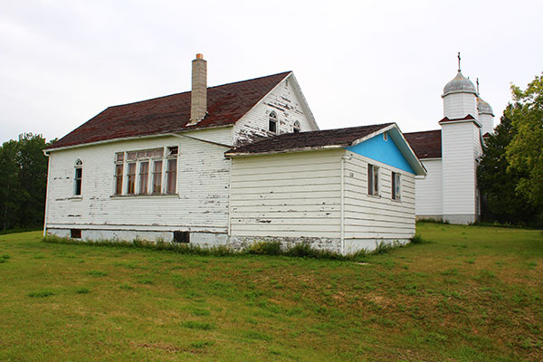 Former one-room schoolhouse that served as the first church