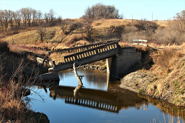 Concrete beam bridge #126 over the Oak River near Bradwardine