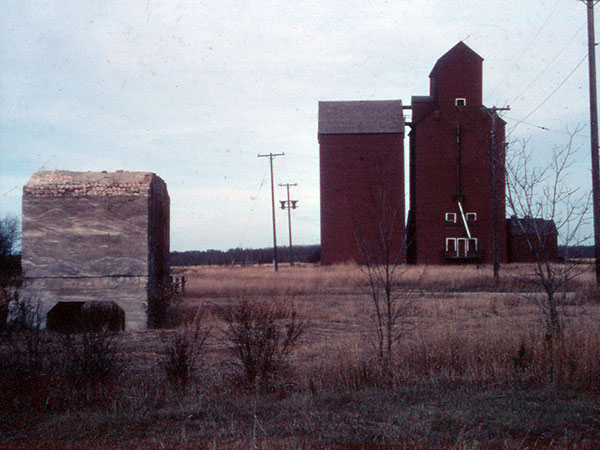 The former Brank of Hamilton vault (left) with the Manitoba Pool grain elevator