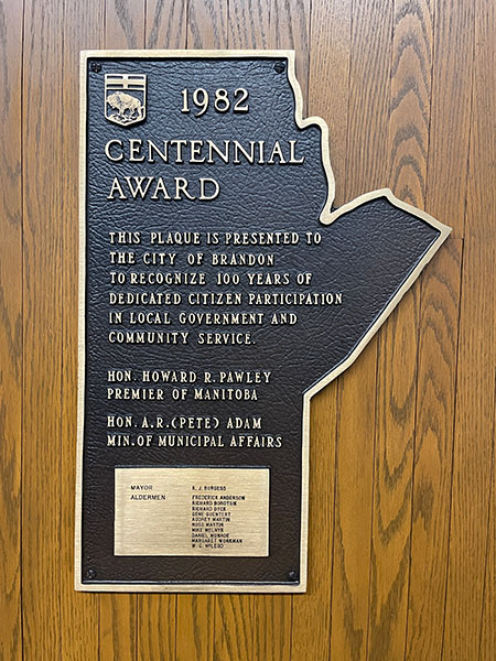 Commemorative plaque inside the Brandon City Hall council chambers