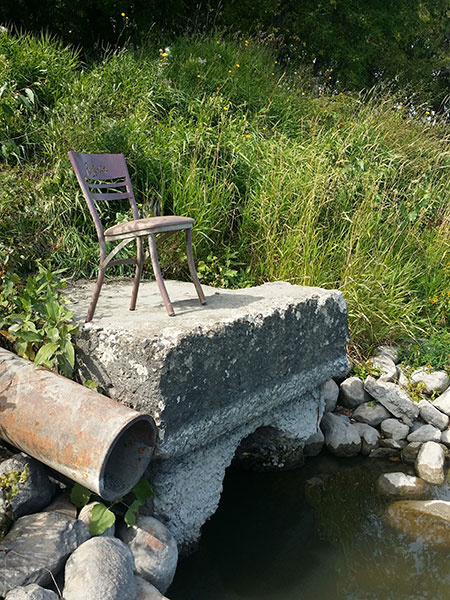 Metal pipe of the discharge point for the former Honey Wagon Shack into the Assiniboine River