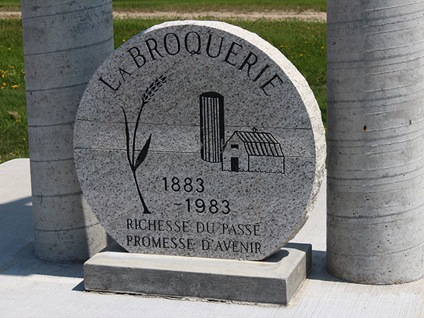 La Broquerie centennial monument beneath Brisette the Cow
