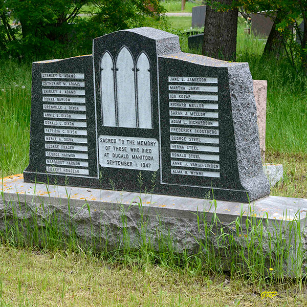 "Teardrop" plot in Commemorative plaque and monument in Monument in Brookside Cemetery for victims of the Dugald Train Disaster