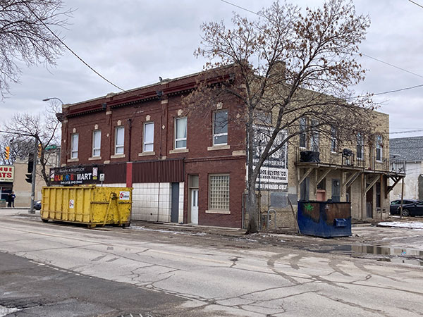 Rear view of Budnik Block after a fire