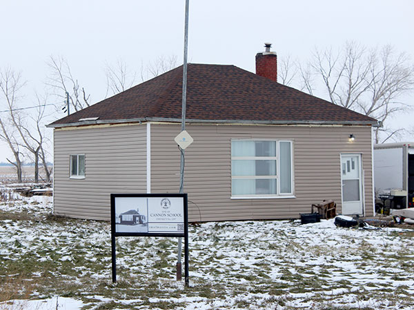The former Cannon School building and commemorative sign