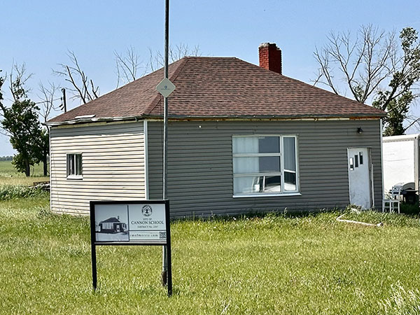 The former Cannon School building and commemorative sign