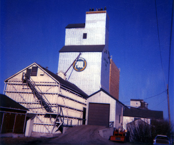 Annex under construction beside the original Manitoba Pool grain elevator at Cartwright