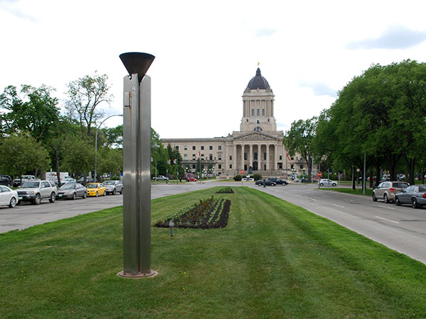 Centennial Torch with the Legislative Building in the background