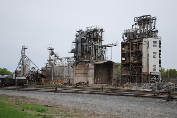 Central Grain Company grain elevator being demolished