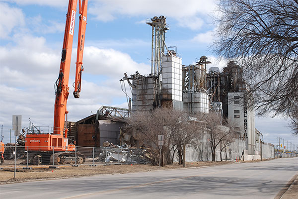 Central Grain Company grain elevator being demolished