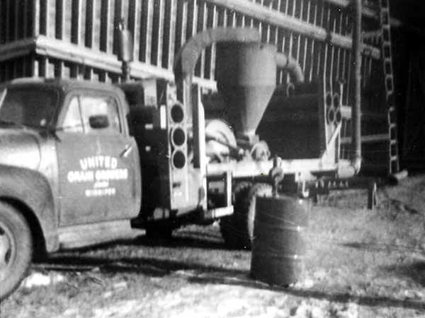 UGG truck beside the grain elevator at Coatstone