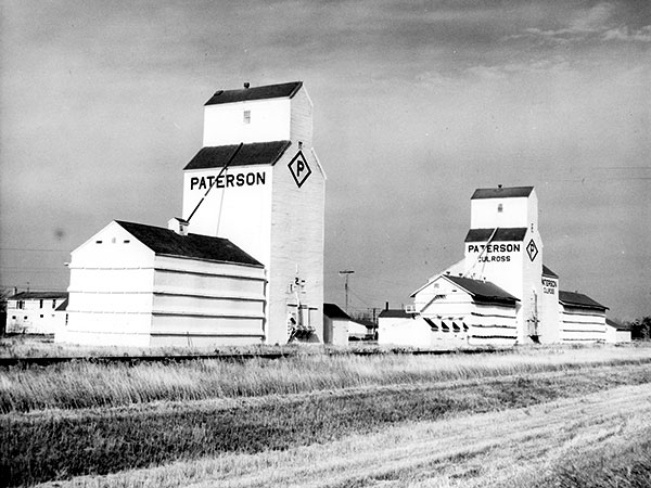 The former UGG grain elevator, left, repainted after its sale to Paterson Grain