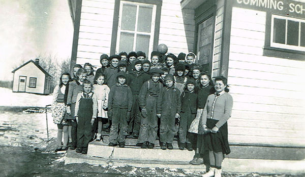Teacher Mary Zroback and students of Cumming School