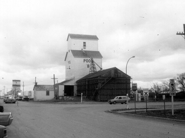 Manitoba Pool Elevator “B” at Deloraine with Federal grain elevator at left background