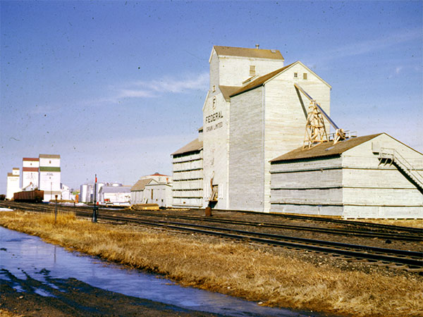 Federal grain elevator at Deloraine with Pool A, Pool B, and UGG elevators in the left background