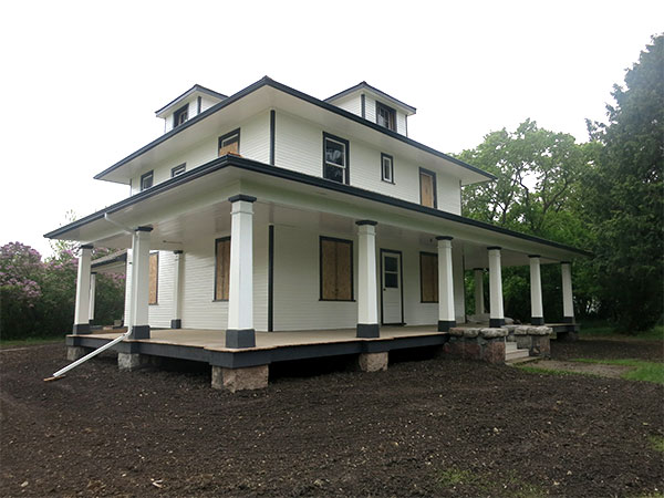 Demonstration Farm House with restored verandah in preparation for installation of new windows and interior renovations