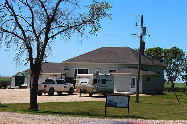 Dewet School building and commemorative sign