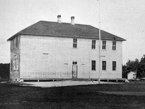 The original Dominion City School building