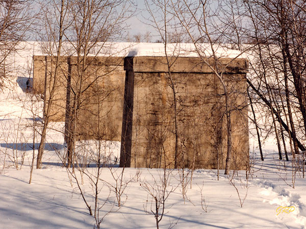 Concrete piers of the former Manitoba Eastern Railway bridge over the Whitemouth River