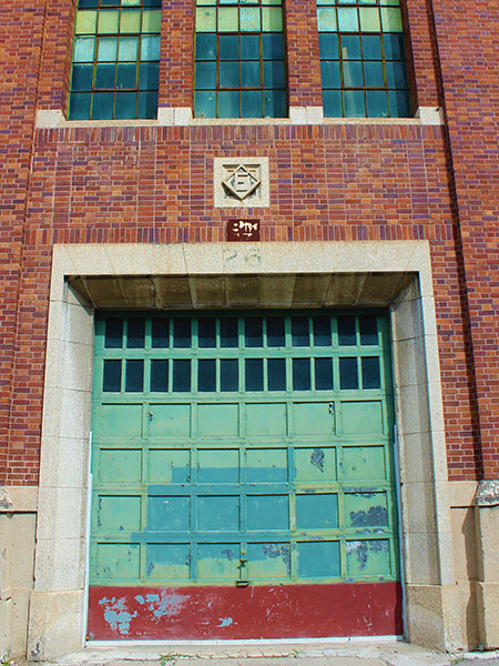 South facade with engraved E above door