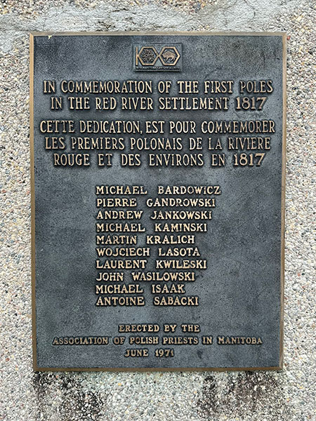 Closeup of First Poles commemorative plaque