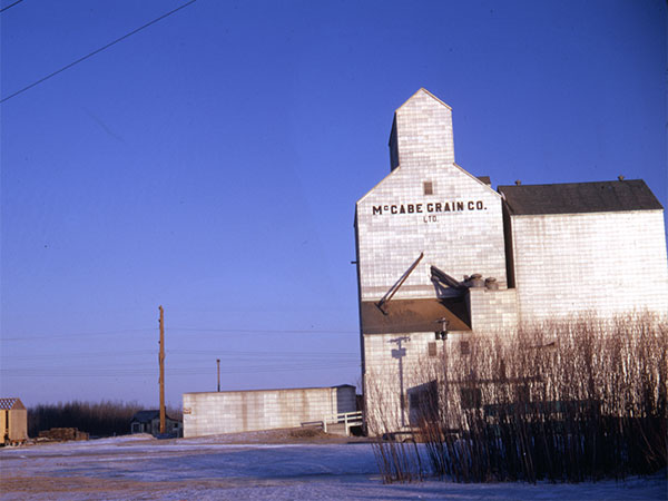 McCabe grain elevator and crib annex at Fort Whyte, before their sale to United Grain Growers
