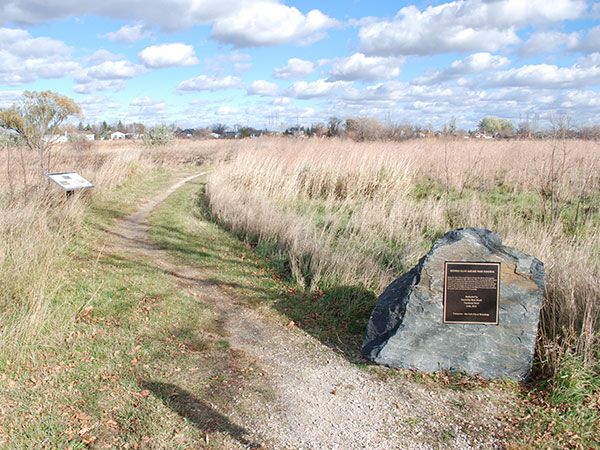 Commemorative plaque in George Olive Nature Park