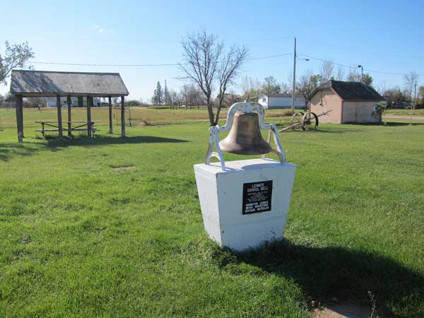 Lennox School bell monument in Goodlands Heritage Park