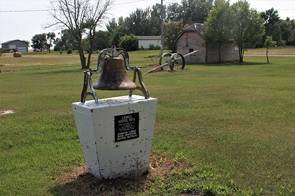 Lennox School bell monument in Goodlands Heritage Park
