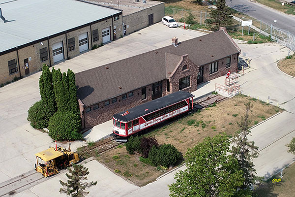 Aerial view of Greater Winnipeg Water District Station and Railway Car