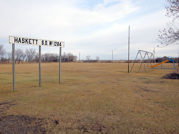 Former site of Haskett School with the sign from the building
