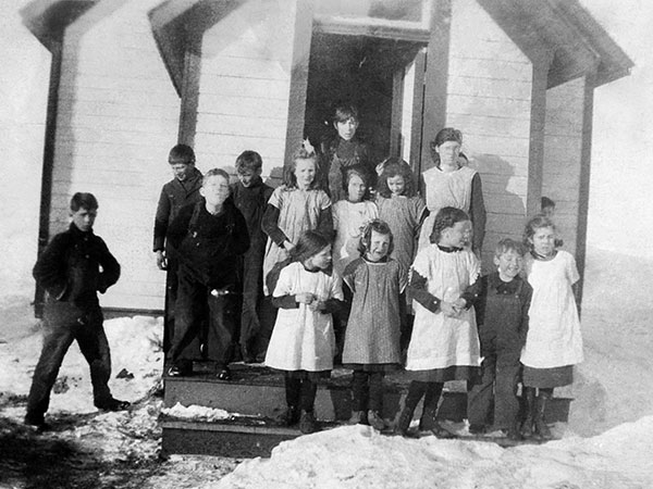 Students at the first Hernefield School building