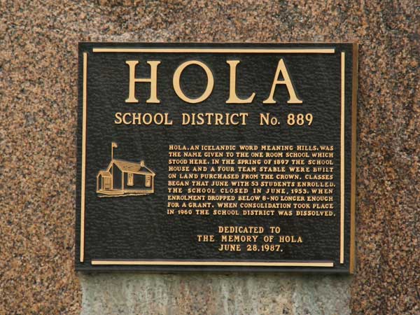 Closeup of the Hola School plaque